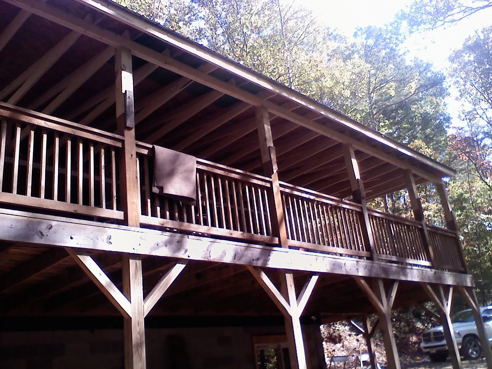 Timber framing under a new elevated porch and deck — Roof Leak Repair in Breckenridge by Roofing Brothers